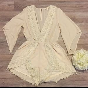 Cream romper BNWT